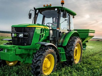 John Deere tractor working in a Pakistani field at an affordable rate