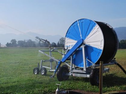 Hose reel irrigation system operating in a Pakistani agricultural field